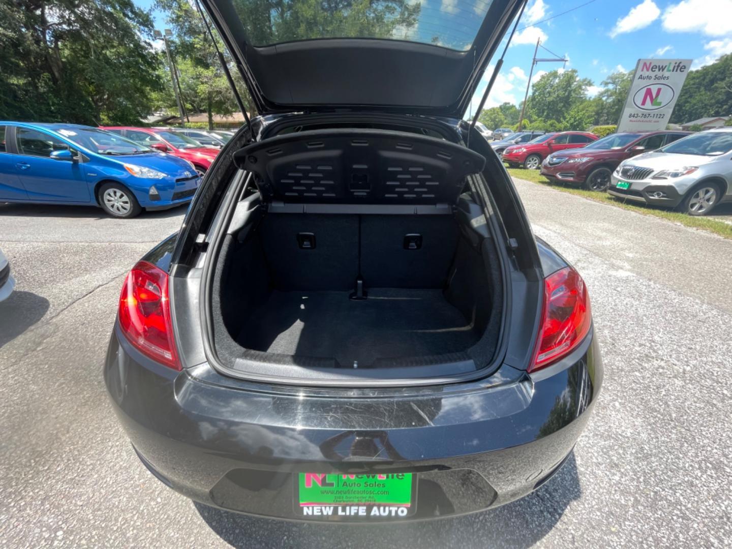 2012 BLACK VOLKSWAGEN BEETLE 2.5L PZEV (3VWJP7AT0CM) with an 2.5L engine, Automatic transmission, located at 5103 Dorchester Rd., Charleston, SC, 29418-5607, (843) 767-1122, 36.245171, -115.228050 - Local Trade-in with Leather, CD/AUX/Bluetooth, Hands-free Phone, Power Windows, Power Locks, Power Mirrors, All-weather Mats, Keyless Entry, Alloy Wheels. Clean CarFax (no accidents reported!) Only 68k miles! Located at New Life Auto Sales! 2023 WINNER for Post & Courier's Charleston's Choice Pre - Photo#12